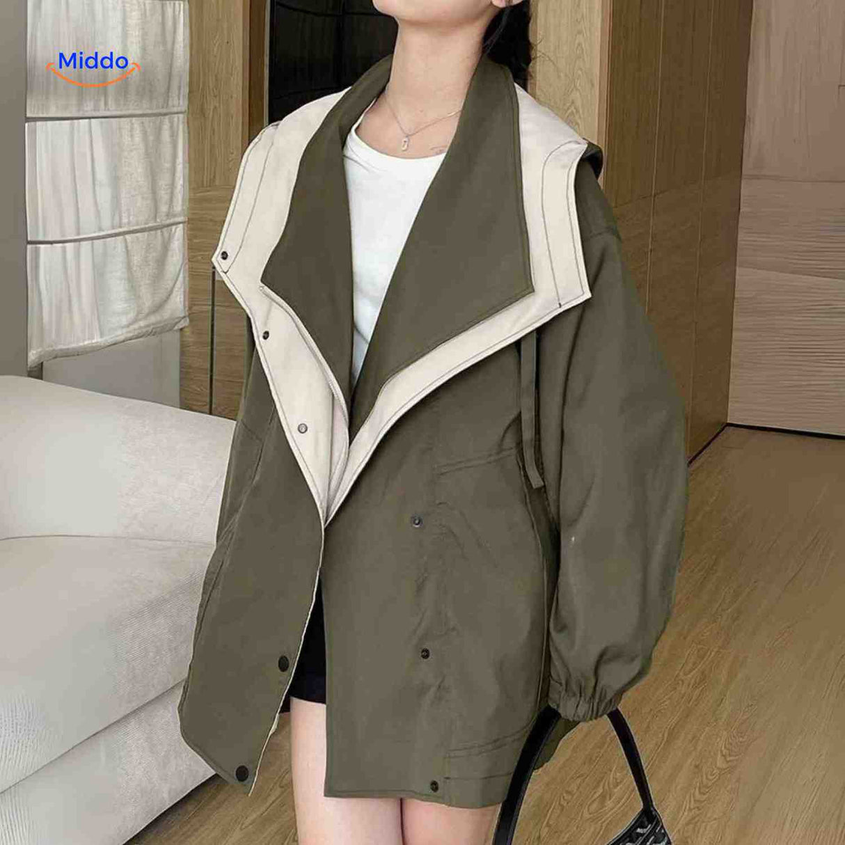 AquaShell Damenjacke in Grün mit kontrastierendem Kragen – bequem und stilvoll. Besuchen Sie www.middo.de!
