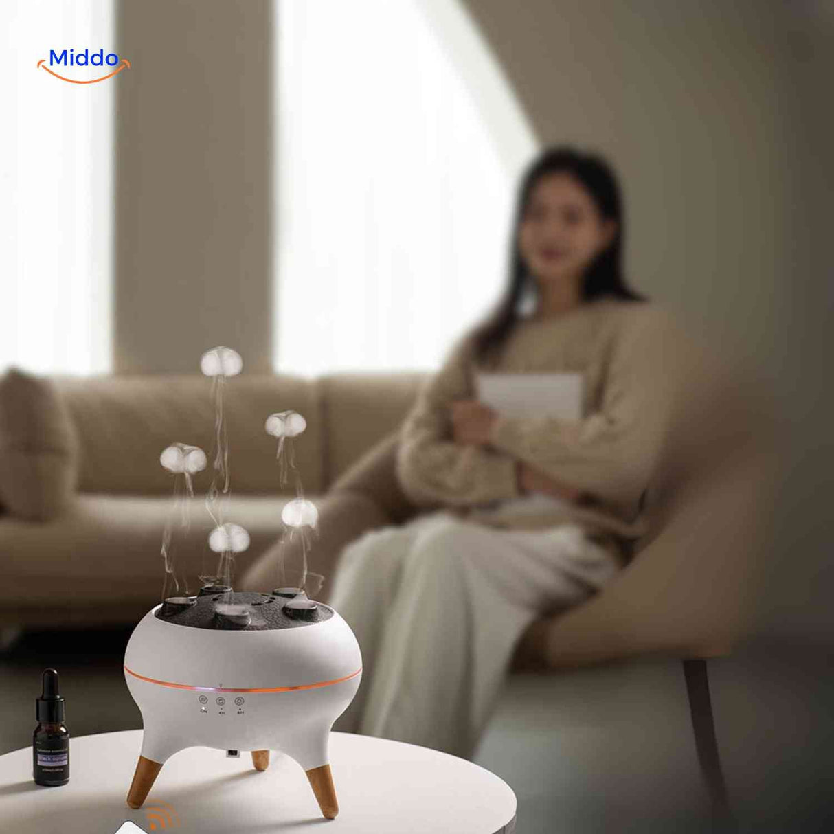 Flamora Diffuser gemütlich im Wohnzimmer mit Aroma-Ausstoß www.middo.de