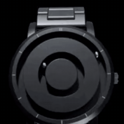 Animierende schwarze Uhr mit magnetischen Zeigern