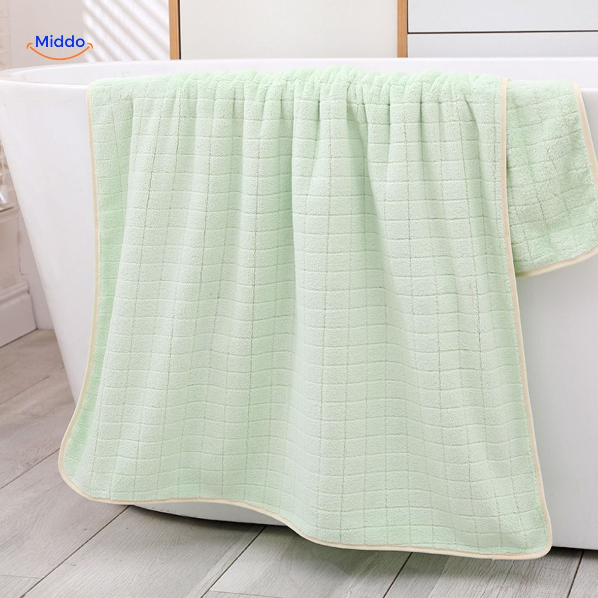 Das Ananasgrid Badetuch ist schnell trocknend und absorbierend – perfekt als stilvolles Geschenk für jeden Anlass