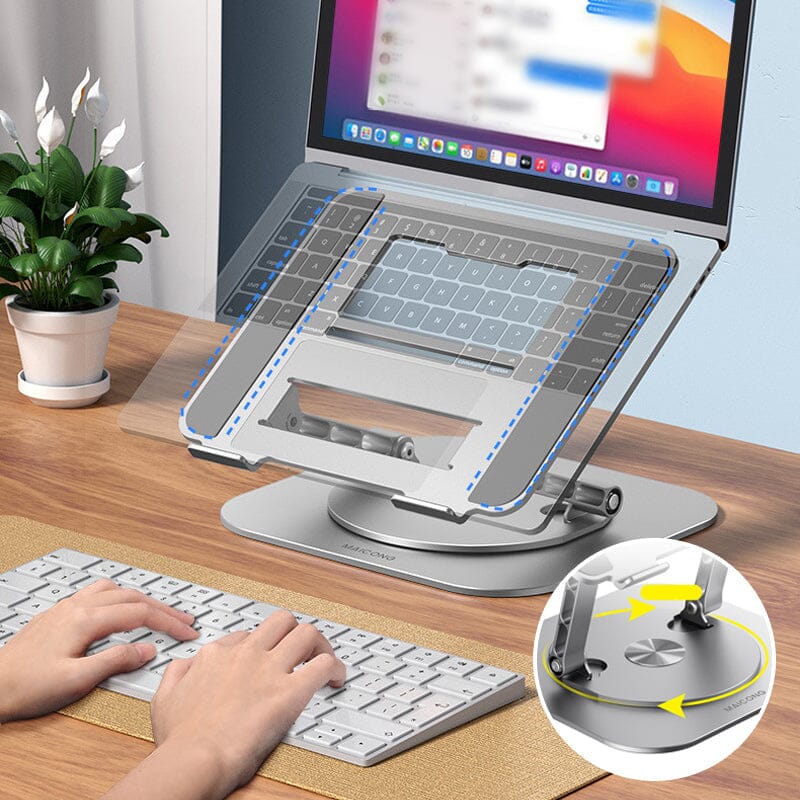Laptop auf 360 Grad drehbarem Ständer neben Tastatur.