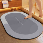 Aquastep Badmat oval in hellgrau - www.middo.de