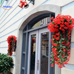 Rote charmante Orchideen Dekoration am Eingang