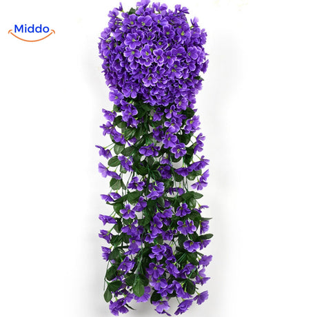 Charmante lila Orchideen an der Wand