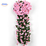 Rosa charmante Orchideen an der Wand