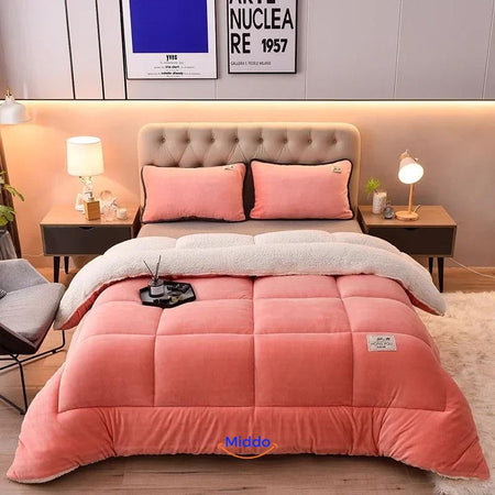 ComfortLux Wol-Velours-Decken in Orange-Rosa auf dem Bett