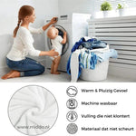 CozyFleece-Plüsch-Decke-Waschbar-www.middo.nlFrau schläft bequem unter der CozyFleece Plüschdecke