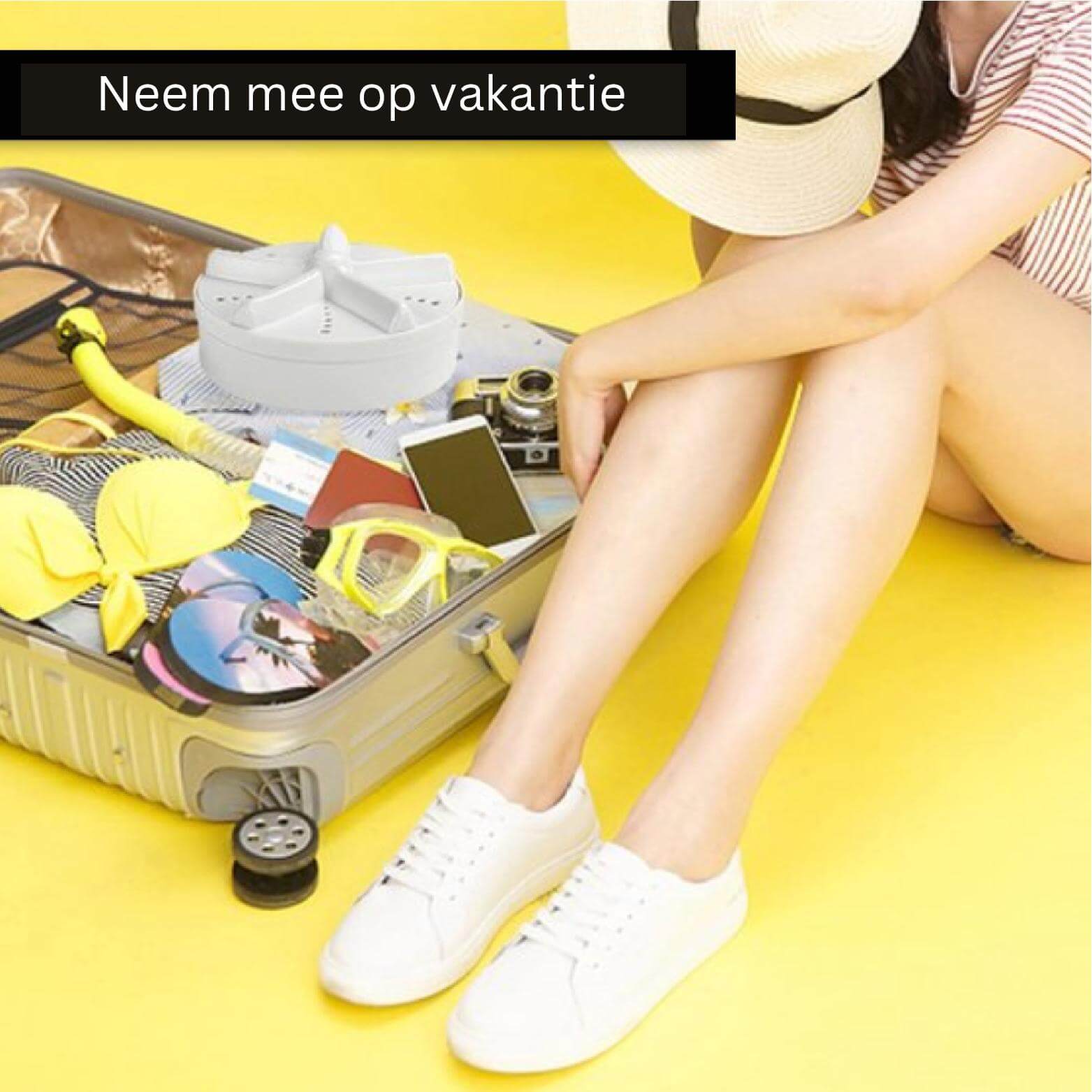 EasyWash Mini-Waschmaschine im Koffer, bereit für den Urlaub.