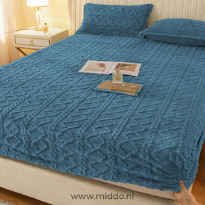 Fleece-Spannbettlaken in Blau.