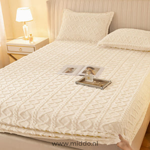 Fleece-Spannbettlaken in Cremeweiß.