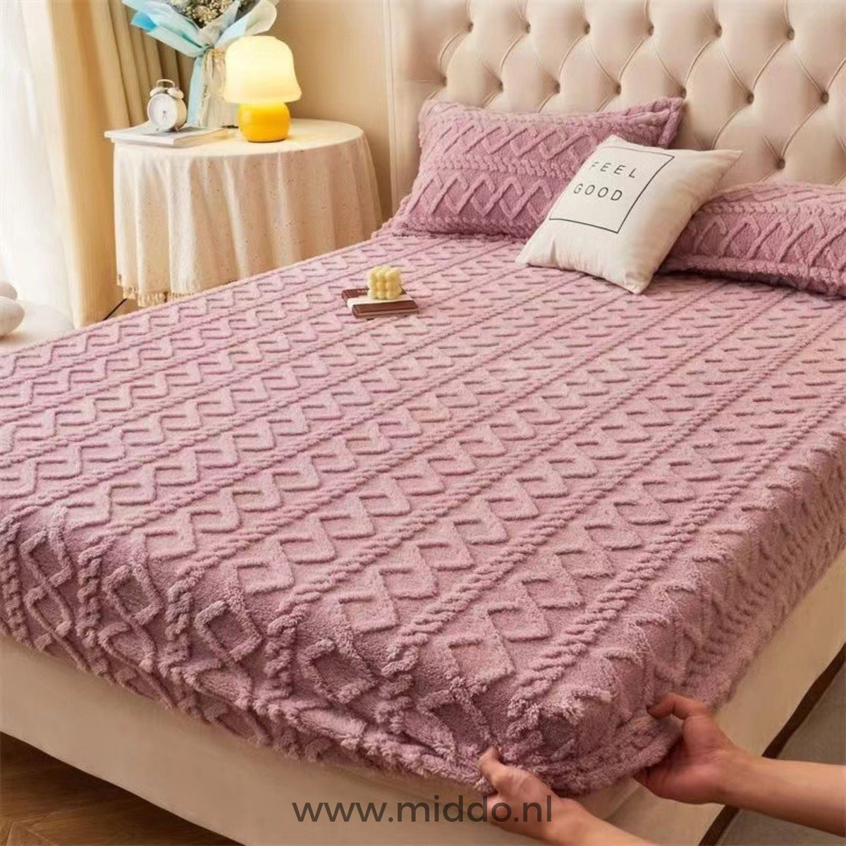 Fleece-Spannbettlaken in Altrosa.