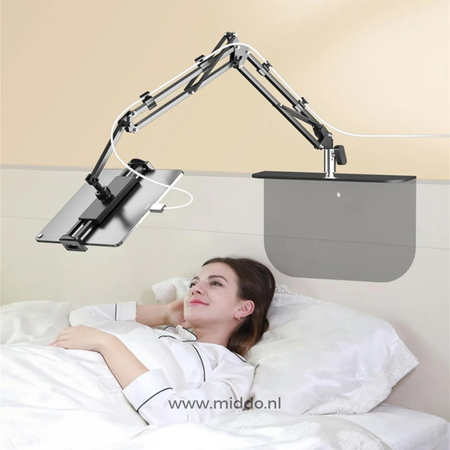 FlexArm mit Tablet-Halterung am Bett befestigt, ideal für die freihändige Nutzung von Tablets