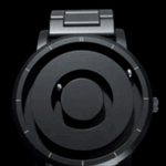 Animierendes schwarzes Uhr mit magnetischen Zeigern