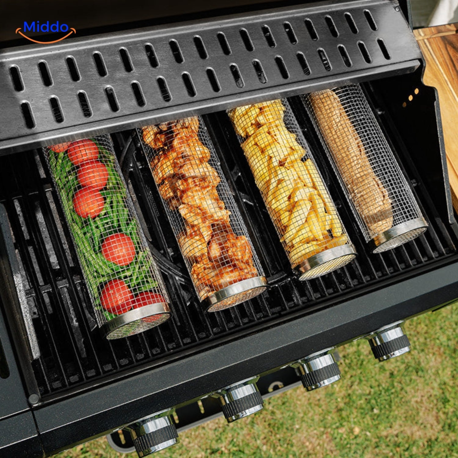 Mehrere RollingGrill™ Körbe mit Gemüse auf dem Grill.