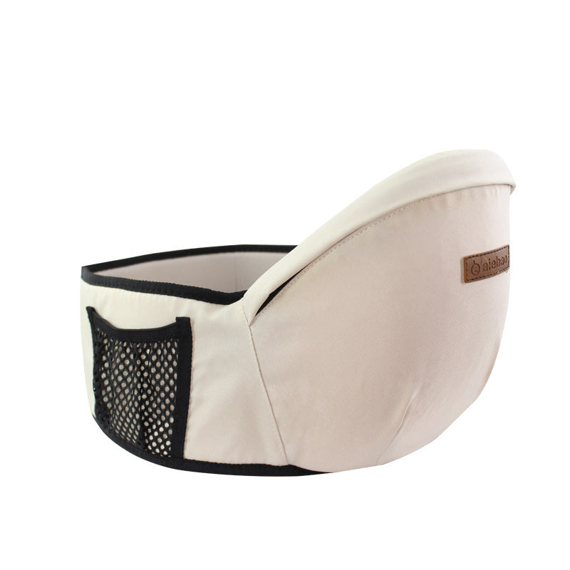 Nahaufnahme von der cremefarbenen SnuggleSeat Babytrage.