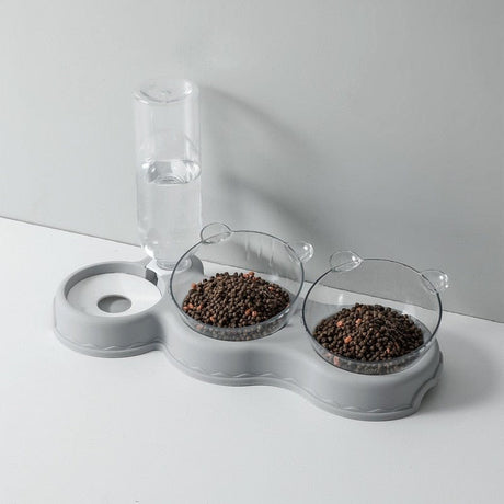 Graue Futterschale mit Wasserspender und Futterbehältern