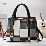 VivaLuxe Tote stilvolle Handtasche mit unterstützenden Riemen und Pompon www.middo.de