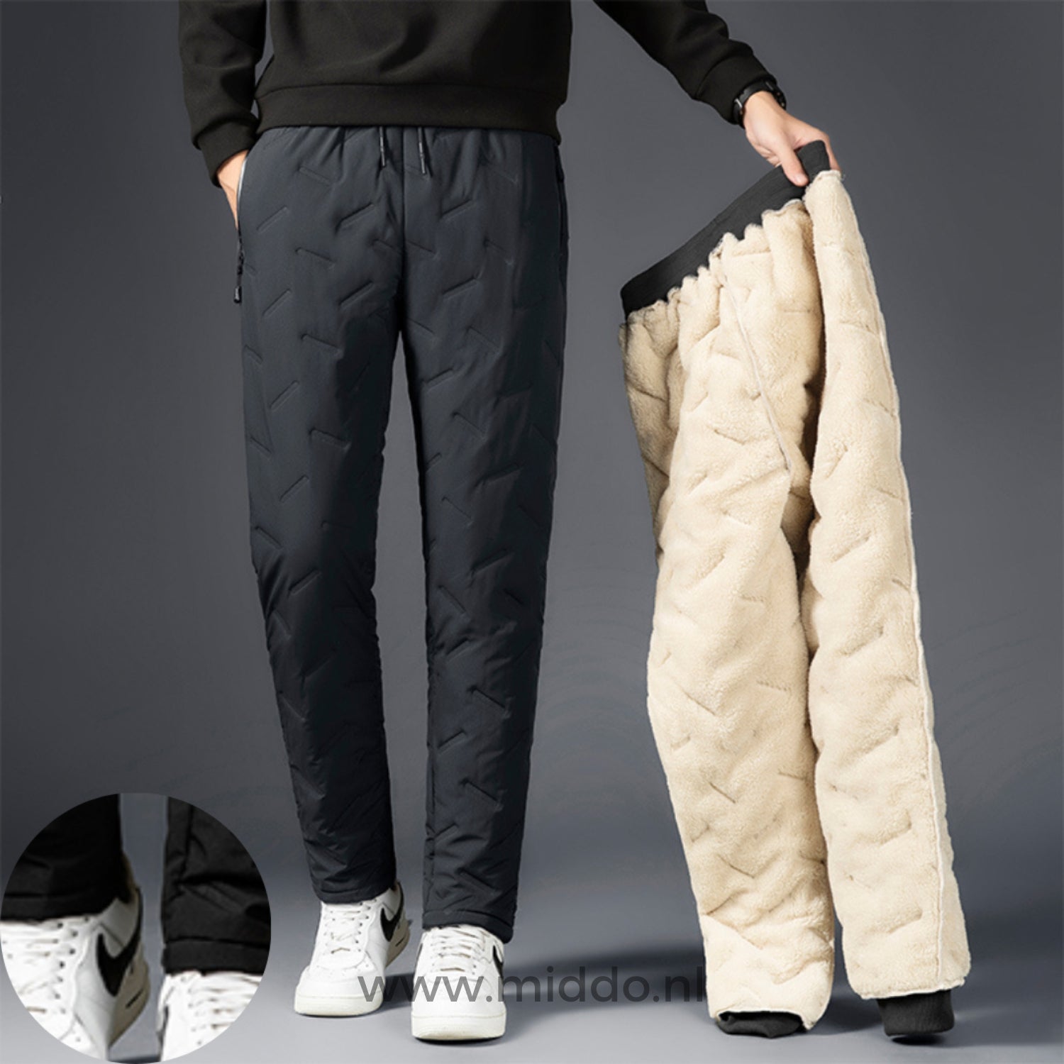 Graue Thermohose neben umgekehrtem beigen Fleece-Futter