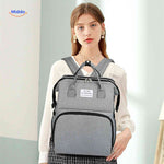BabyLuxe Rucksack in Grau – Tragbare Wickeltasche mit elegantem Design | www.middo.de