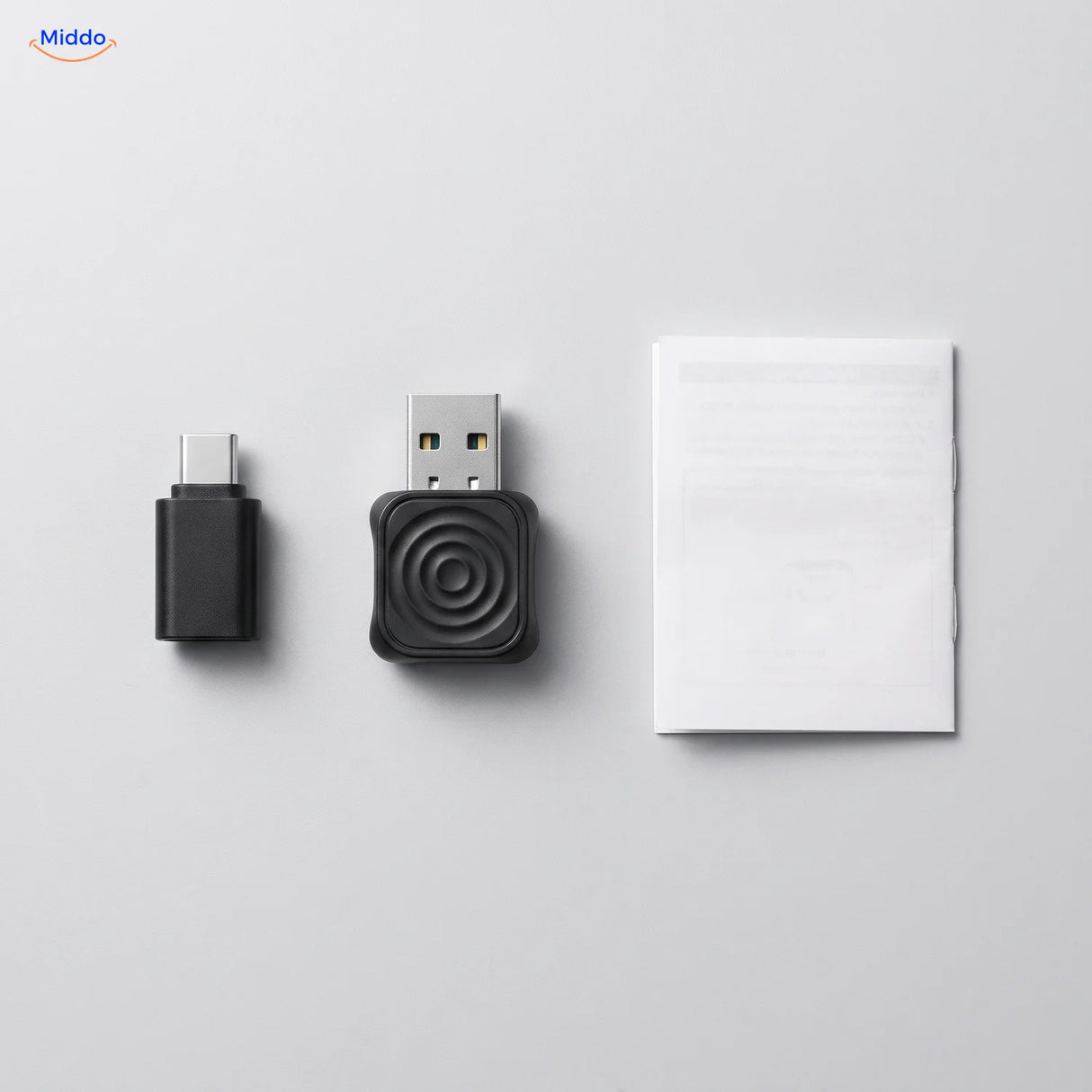 Lieferumfang: Adapter, USB-C-Adapter und Anleitung