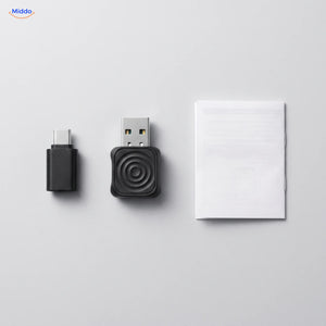 Lieferumfang: Adapter, USB-C-Adapter und Anleitung