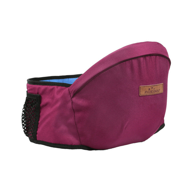 Dunkelrosa SnuggleSeat Babytrage mit Netzfach.