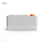 dreamglow Lautsprecher minimalistisches Design mit orangefarbener Steuerungstaste www.middo.nl