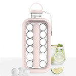 FrostyBalls-rosafarbene Eishalter mit Limodrink daneben