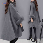 Furina Capejas - Rückansicht graue Fell-Poncho | www.middo.de