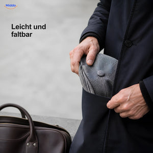 Faltbare Heritage Eight Schiebermütze wird in einer Jackentasche verstaut