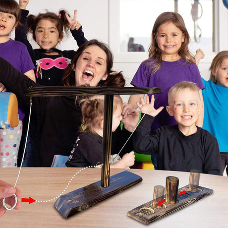 Kinder spielen Holz Ringwurf Trinkspiel