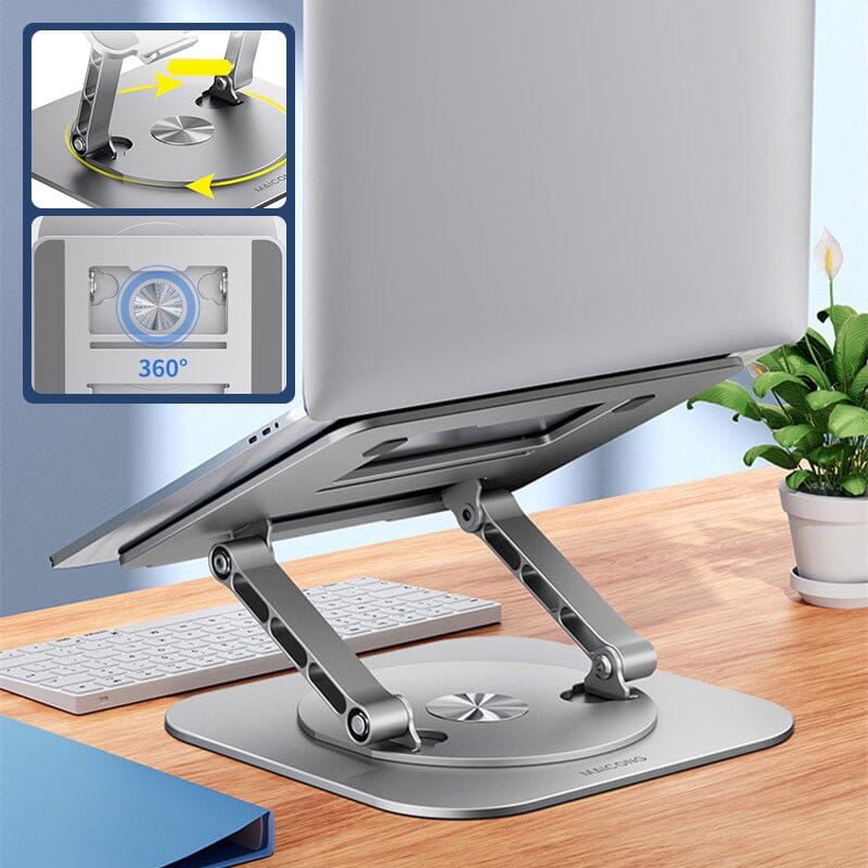 Laptop auf 360-Grad-Ständer mit Tastatur und Pflanze.