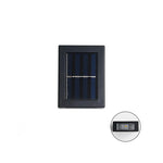 Einzelne Solarpanel Außenlampe mit An- und Ausknopf auf weißem Hintergrund.