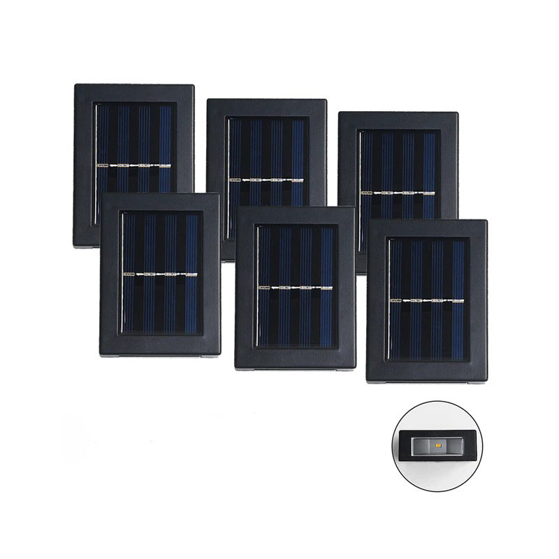 Sechs Solarpanel Außenlampen in einer Reihe auf einem weißen Hintergrund.
