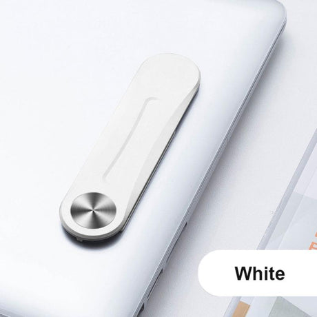 Magnetische weiße Klammer befestigt an einem Laptop
