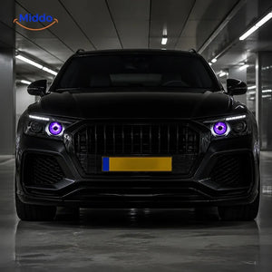 NightStare LED-Augendekoration für Scheinwerfer: Frontansicht eines Autos mit violetten Augen in einer Garage.
