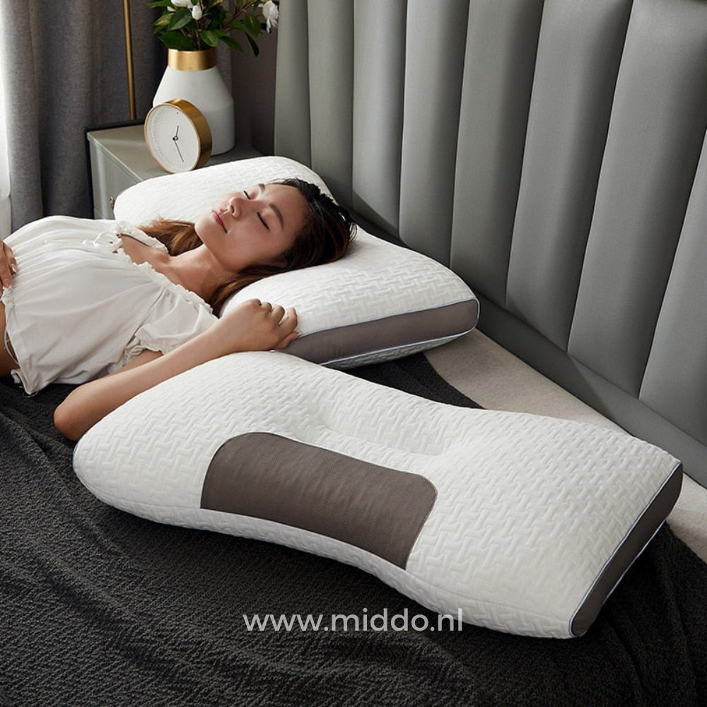 Frau schläft bequem auf dem DreamGuard Pro Kissen.