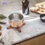 woodinex Untersetzer Küchenaufstellung mit Holzuntersetzer und kupferner Pfanne www.middo.nl